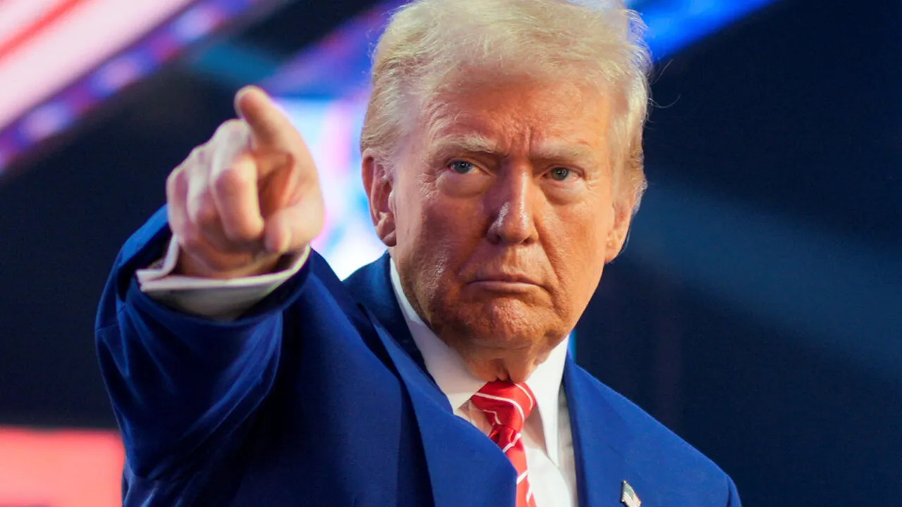 2024-12-22T185749Z_1682455386_RC2HUBAJW3SP_RTRMADP_3_USA-TRUMP